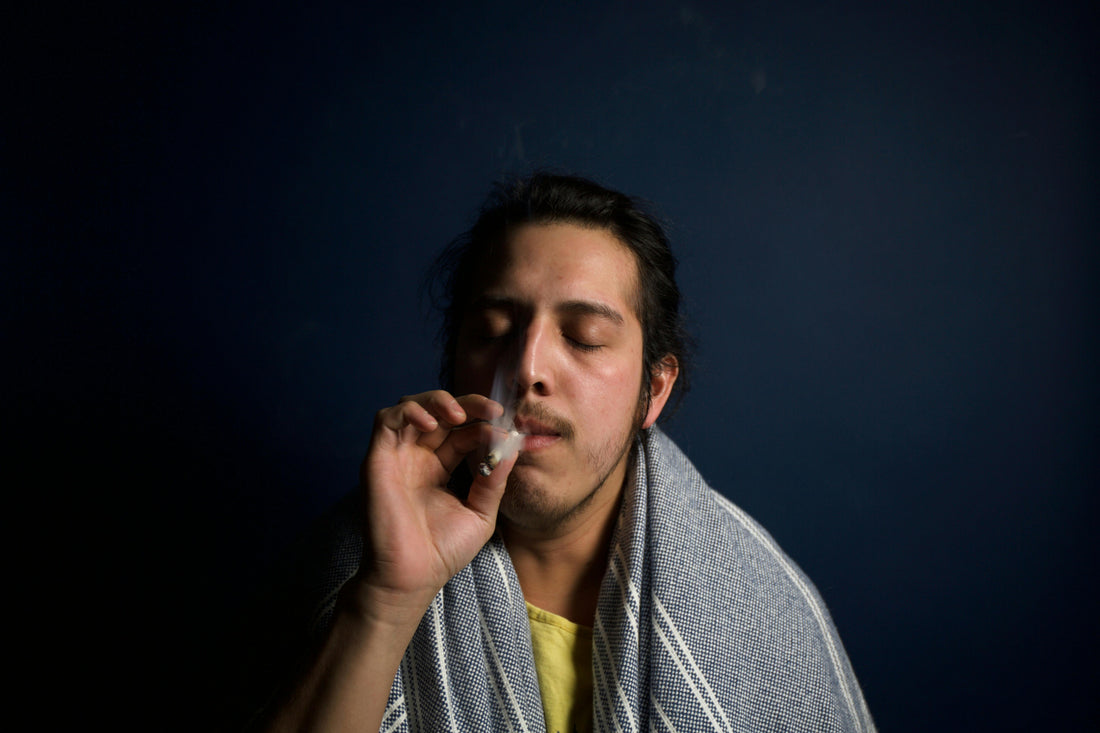 Person smoking a weed joint