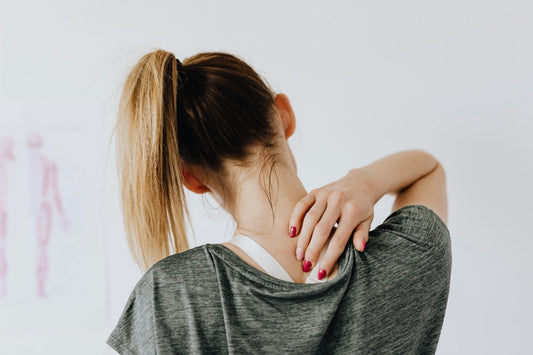 Woman suffering from backpain