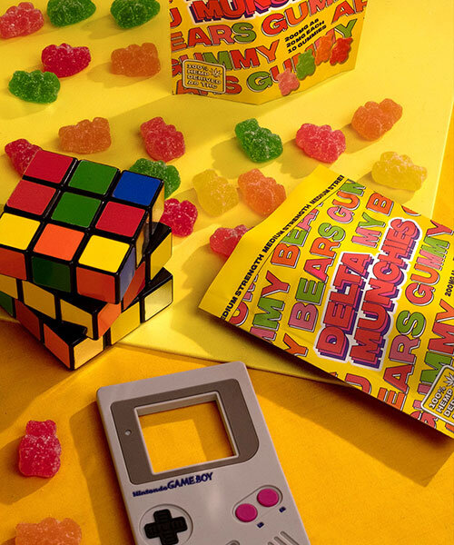 retro style delta 8 gummy bears are laid out next to a rubrics cube and retro gameboy.