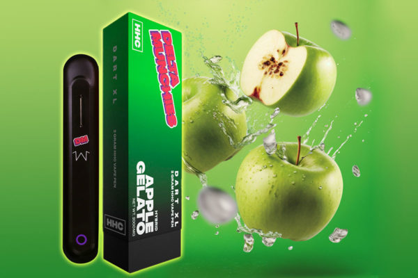 Delta Munchies' Apple Gelato HHC Disposable next to 2 and a half green apples.
