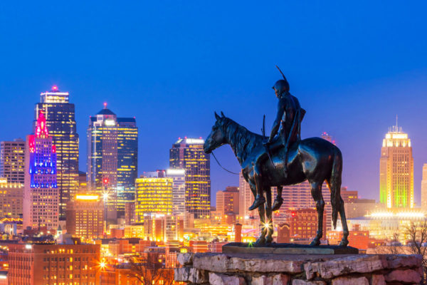 The Scout statue with Kansas City in the background.