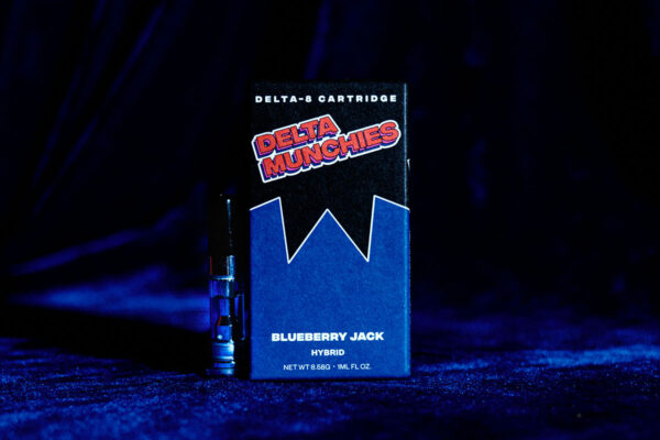 Delta Munchies Blueberry Jack Delta 8 cartridge on a blue background.