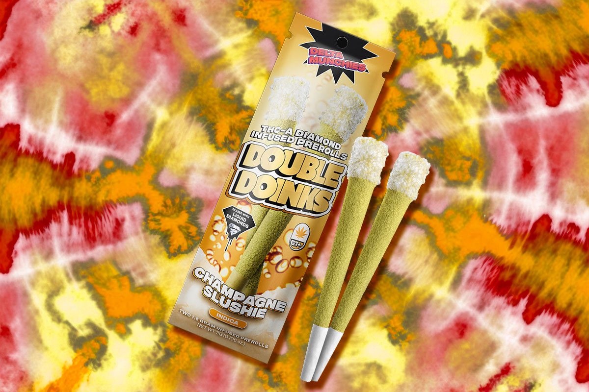 Pack of a THC-A Double Doinks Diamond infused prerolls in champagne slushie flavor with a multi-colored backdrop