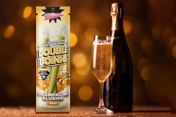 Delta Munchies Double Doinks infused prerolls in Champagne Slushie flavor, along with Champagne in a glass and a bottle on dark background