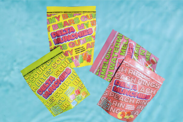 Four-pack of Delta Munchies gummies with four different flavors: Sour Bites, Gummy Bears, Watermelon, and Peach Rings