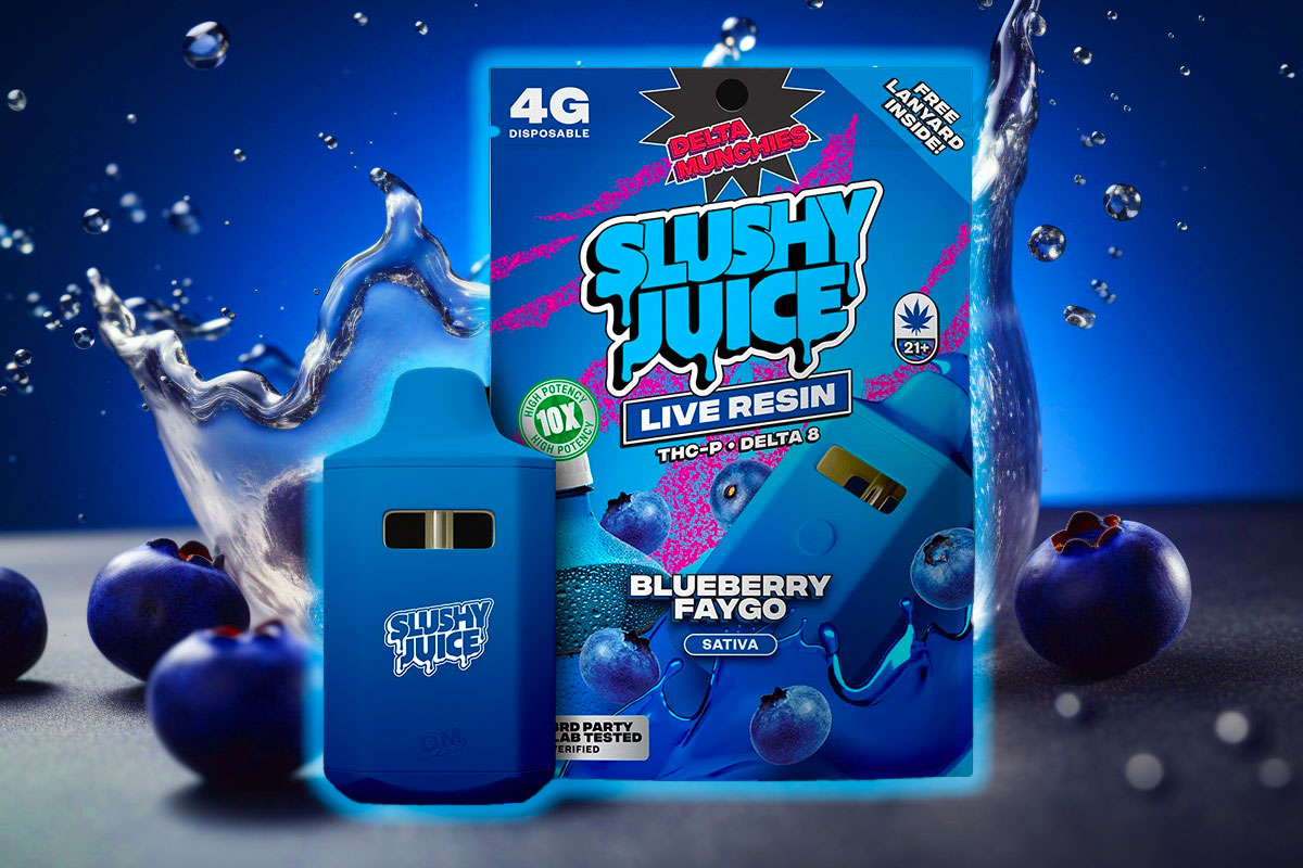 A pack of Slushy Juice Live Resin in Blueberry Faygo flavor placed on a bluish surface, accompanied by a bottle and fresh blueberries