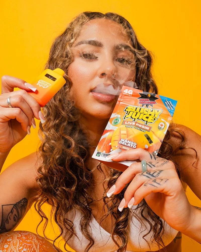 Munchies THC-p vape slushy juice being held and smoked by a model